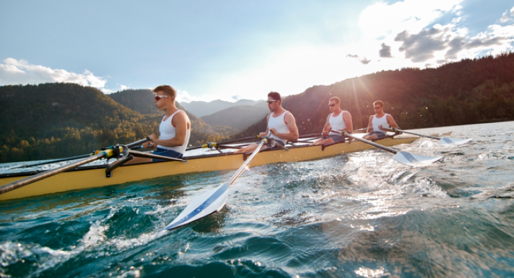 Team of 4 rowers in practice