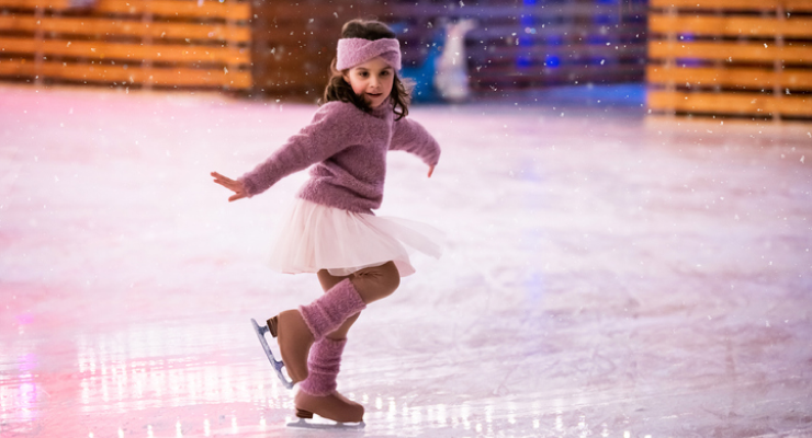 Girl practicing ice skating