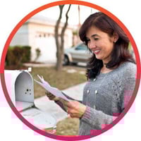 Woman checking her mailbox