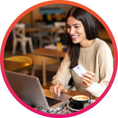 Woman making online purchase on her laptop