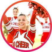 Girls cheer squad raising pom poms