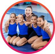 Girls gymnastics team in a huddle