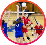 Girls youth volleyball teams playing in a match