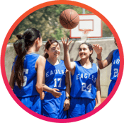 Youth girls basketball team preparing for a game