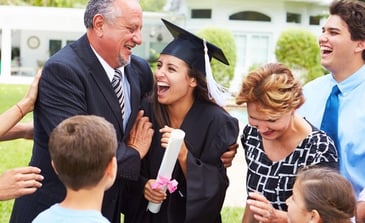 family celebrating a graduate