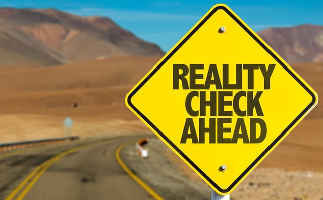 Reality_check_ahead_sign.jpg