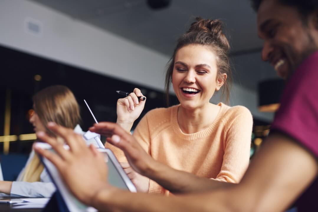 couple playing trivia on an iPad