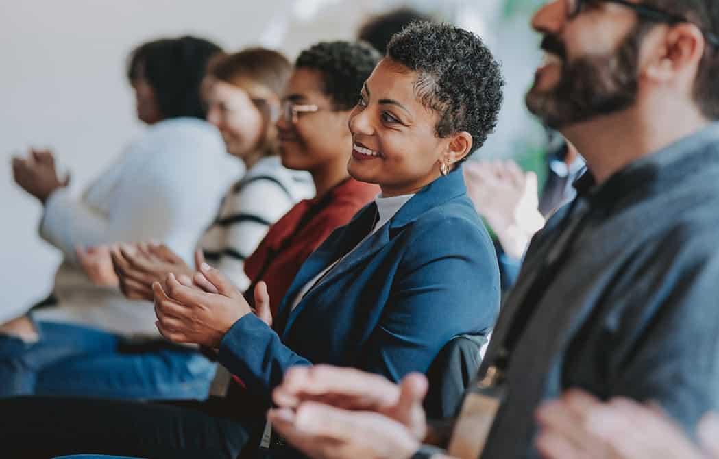 inspired audience at a fundraising meeting