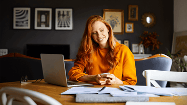 woman planning fundraiser marketing at home