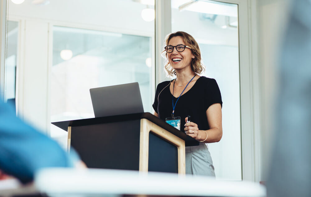 woman speaking at a nonprofit event