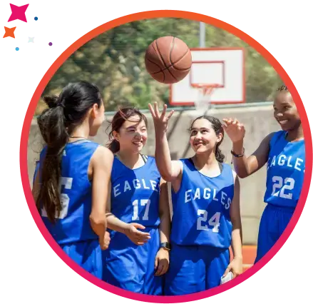 Youth girls basketball team preparing for a game