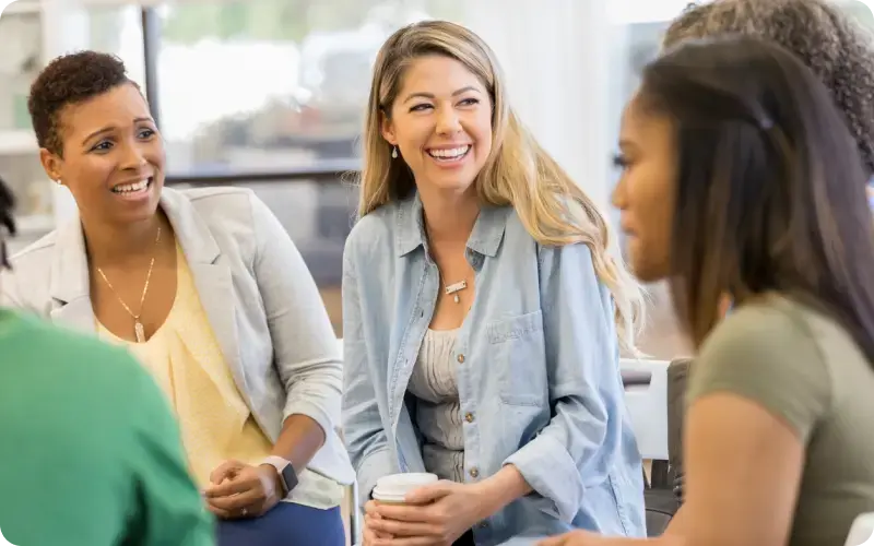 nonprofit team members gathered in a meeting