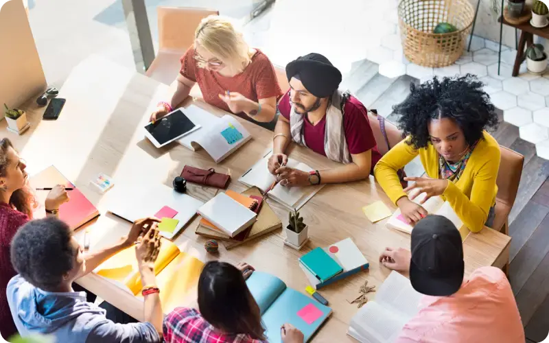 Private school teachers and administrators in a meeting