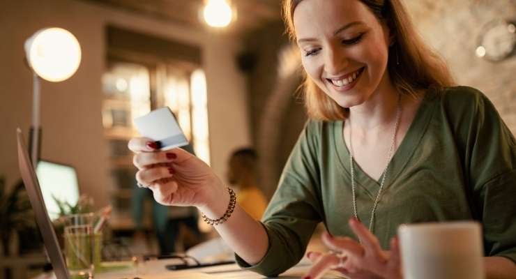 Woman shopping online from her desk